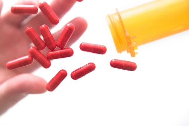 grabbing pills