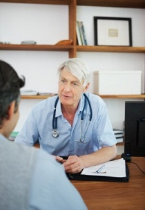 Doctor advising a client while at the office