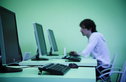 young student in computer classroom