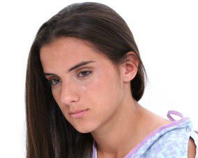 Beautiful Teen Girl In Hospital Gown Crying
