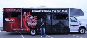 NADCP CEO West Huddleston holds the All Rise Gavel on the Pacific coast