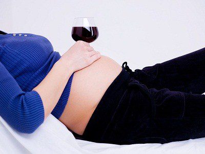 glass of wine on the stomach