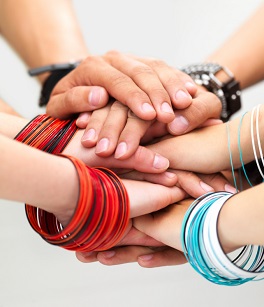 Hands of young guys and girls