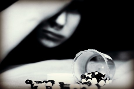 Teen with pills