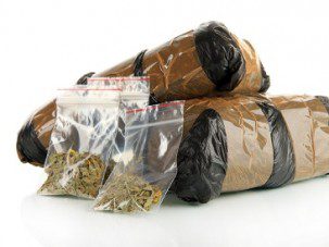 Packages of narcotics isolated on white
