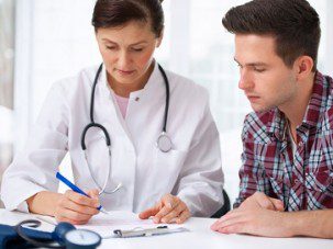 doctor with male patient