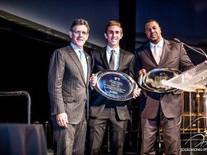 L-R: Timothy Brosnan, EVP Business, Major League Baseball; Garrett Burk, teen athlete winner; Steven Carter, youth coach winner