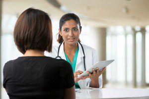 Doctor consulting with a patient.