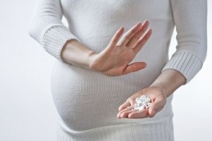 pregnant woman with pills 1-27-15
